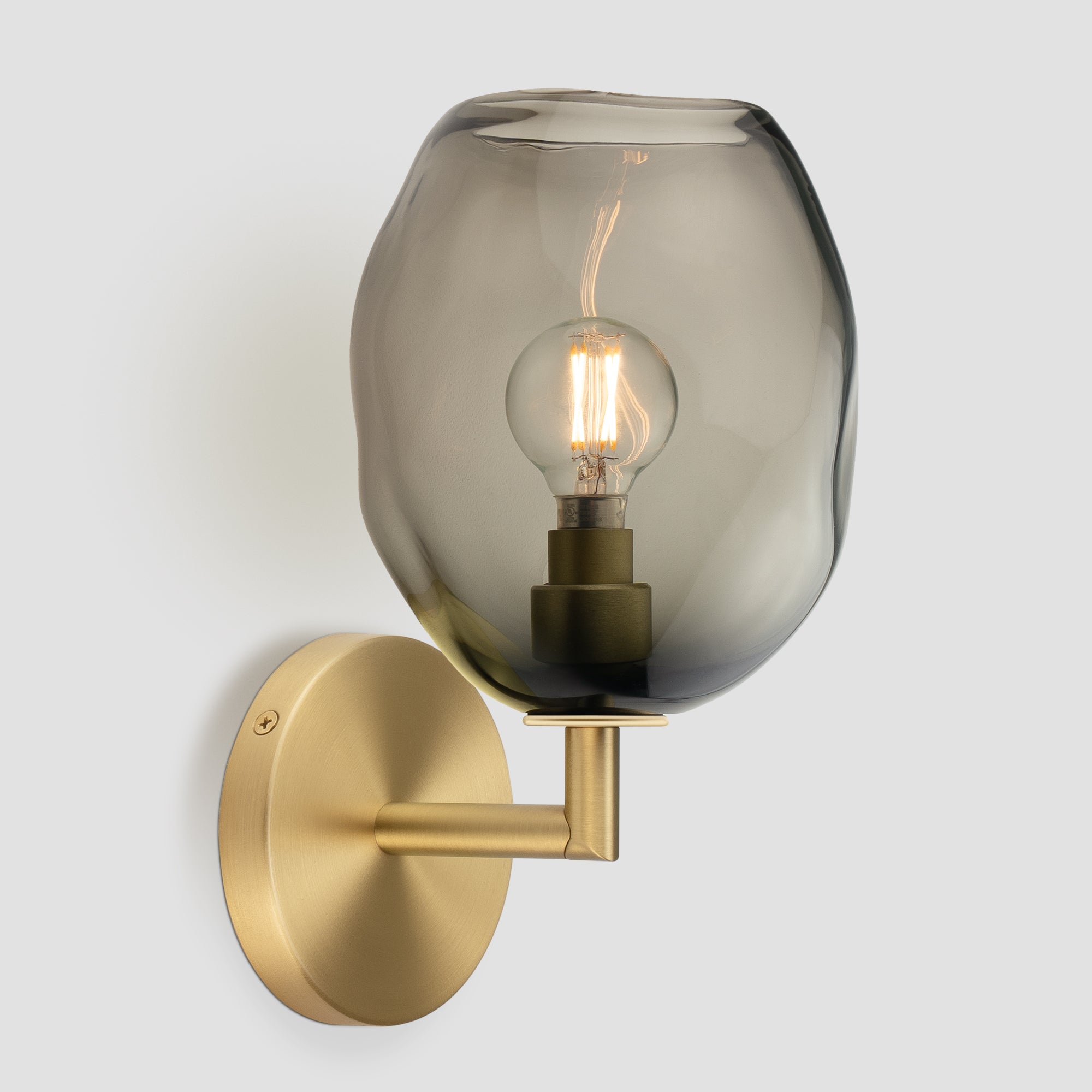 Wabi Sconce Grey Glass Brushed Brass Metal Round Canopy